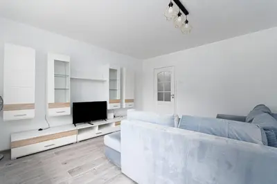 Telewizja i/lub zestaw kina domowego w obiekcie Rynek Wrocław Homely Apartment by BookingHost