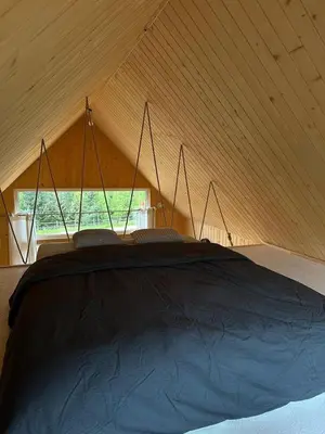 Łóżko lub łóżka w pokoju w obiekcie Sunny Houses domki rekreacyjne