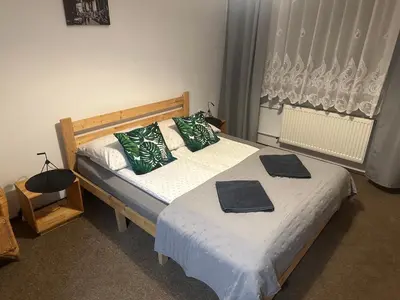 Łóżko lub łóżka w pokoju w obiekcie Apart' otel 23