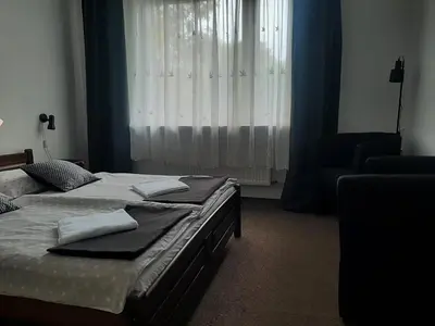 Łóżko lub łóżka w pokoju w obiekcie Apart' otel 23