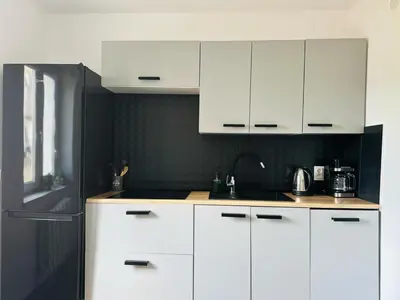 Kuchnia lub aneks kuchenny w obiekcie Rodzinna Przystań