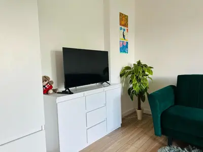 Telewizja i/lub zestaw kina domowego w obiekcie Rodzinna Przystań