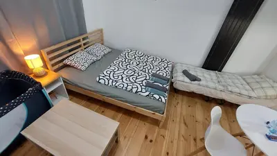 Łóżko lub łóżka w pokoju w obiekcie MagMar Studio Kluczbork