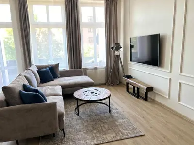 Telewizja i/lub zestaw kina domowego w obiekcie Apartament No. 5 City Center