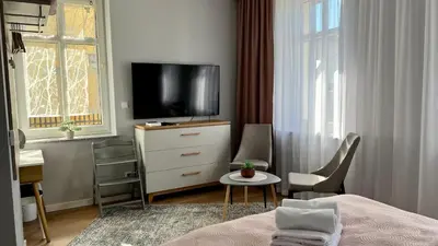 Telewizja i/lub zestaw kina domowego w obiekcie LAWENDOWE NOCOWANIE Zdrojowa 9 lokal 1B