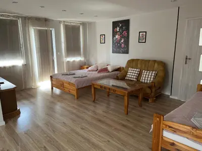 Łóżko lub łóżka w pokoju w obiekcie Apartament Sofii