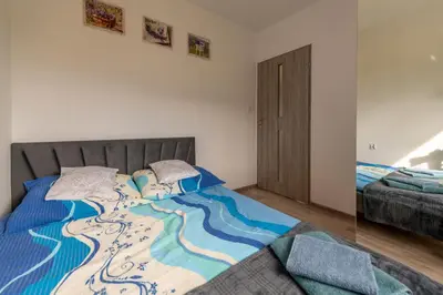 Łóżko lub łóżka w pokoju w obiekcie Domek Nad Wodospadem Radochów