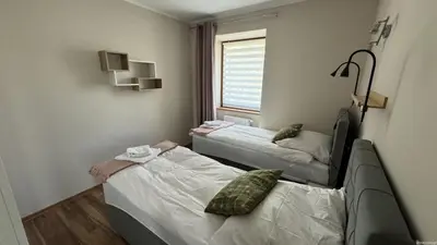Łóżko lub łóżka w pokoju w obiekcie Apartament Piątka Wałbrzych