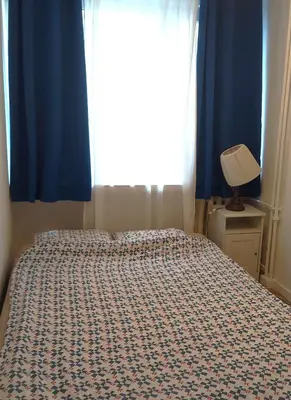 Łóżko lub łóżka w pokoju w obiekcie Wrocław University Apartment