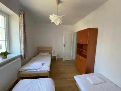 Łóżko lub łóżka w pokoju w obiekcie PrzyLądek Zdrój Bike Apart