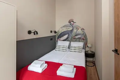 Łóżko lub łóżka w pokoju w obiekcie Budget Apartment Gliwice 1min from Main Square