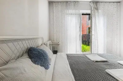 Łóżko lub łóżka w pokoju w obiekcie Apartament Parking & Balkon