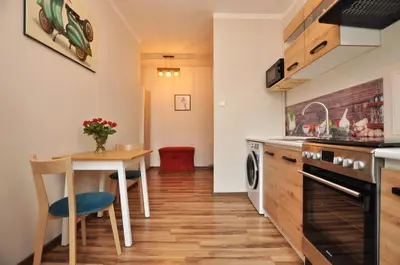 Kuchnia lub aneks kuchenny w obiekcie Słoneczny Apartament przy Rynku