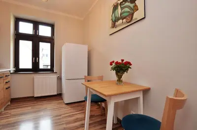 Kuchnia lub aneks kuchenny w obiekcie Słoneczny Apartament przy Rynku