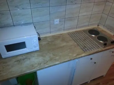 Kuchnia lub aneks kuchenny w obiekcie Apartament na Pilczycach