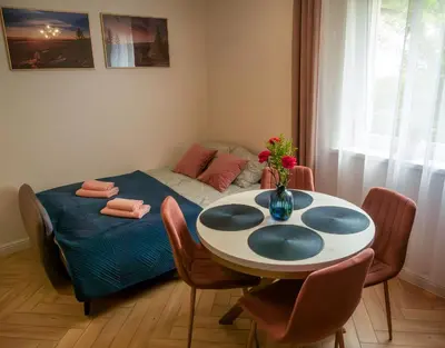 Łóżko lub łóżka w pokoju w obiekcie Apartamenty Cud Miód 1