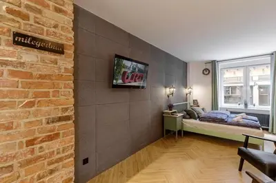 Telewizja i/lub zestaw kina domowego w obiekcie Jan's Urban Retreat