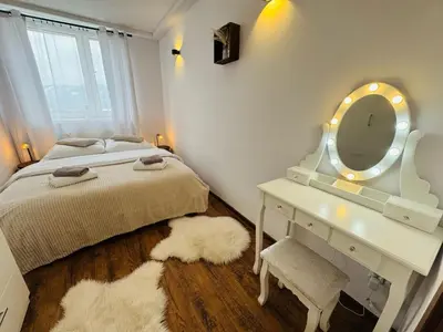 Łóżko lub łóżka w pokoju w obiekcie Rodzinne Wzgórze