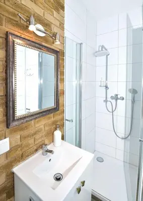 Łazienka w obiekcie Komfortowe apartamenty przy Rynku Klimatyzacja
