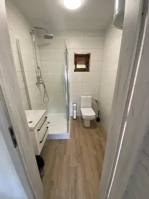 Łazienka w obiekcie Domki pod Dębami