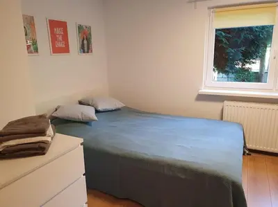 Łóżko lub łóżka w pokoju w obiekcie Apartament Jasminum