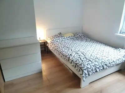 Łóżko lub łóżka w pokoju w obiekcie Apartament Jasminum