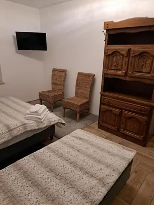 Łóżko lub łóżka w pokoju w obiekcie Pensjonat u cioci Reni