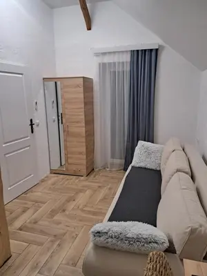 Łóżko lub łóżka w pokoju w obiekcie Pensjonat u cioci Reni