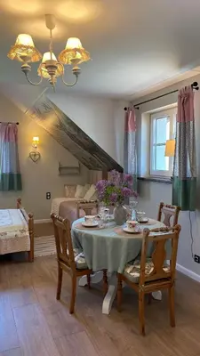Łóżko lub łóżka w pokoju w obiekcie Dom Gościnny Wróbliczówka