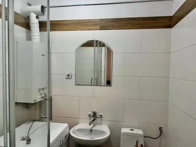 Łazienka w obiekcie Tanie Noclegi Puszkina 2
