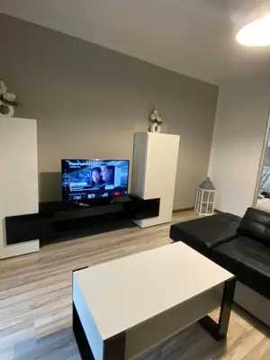 Telewizja i/lub zestaw kina domowego w obiekcie APARTAMENTY CIUKAJ