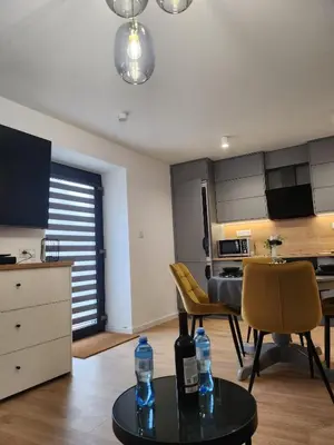 Telewizja i/lub zestaw kina domowego w obiekcie Apartament Forest