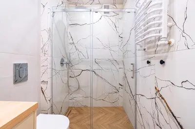 Łazienka w obiekcie Apartament Radosny, Klimatyzacja, PW INVEST HOME