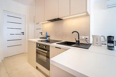 Kuchnia lub aneks kuchenny w obiekcie Apartament Radosny, Klimatyzacja, PW INVEST HOME