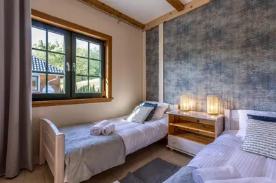 Łóżko lub łóżka w pokoju w obiekcie Jesteśmy Na Ty - Apartamenty
