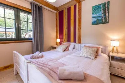 Łóżko lub łóżka w pokoju w obiekcie Jesteśmy Na Ty - Apartamenty