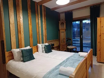 Łóżko lub łóżka w pokoju w obiekcie Jesteśmy Na Ty - Apartamenty