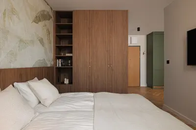 Łóżko lub łóżka w pokoju w obiekcie Studio Verde Legnicka Residence