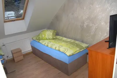 Łóżko lub łóżka w pokoju w obiekcie Agroturystyka Sokolec Górski