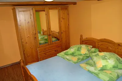 Łóżko lub łóżka w pokoju w obiekcie Agroturystyka Sokolec Górski