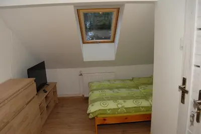 Łóżko lub łóżka w pokoju w obiekcie Agroturystyka Sokolec Górski