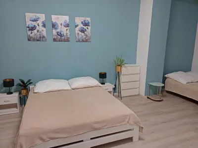 Łóżko lub łóżka w pokoju w obiekcie Mieszkanie w rynku