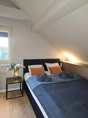 Łóżko lub łóżka w pokoju w obiekcie Villa Evmerol