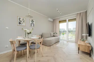 Telewizja i/lub zestaw kina domowego w obiekcie Modern Apartment with Parking and Air-Conditioning in Wrocław by Noclegi Renters
