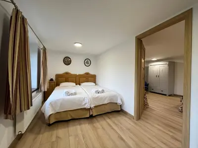 Łóżko lub łóżka w pokoju w obiekcie Dom Podgórze 23