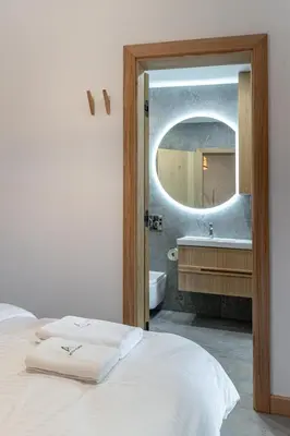 Łóżko lub łóżka w pokoju w obiekcie Apartamenty Activ Zdrój