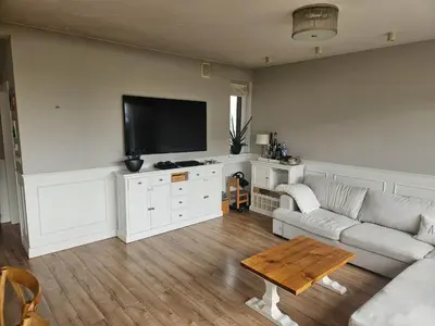 Telewizja i/lub zestaw kina domowego w obiekcie Przytulne mieszkanie z kominkiem