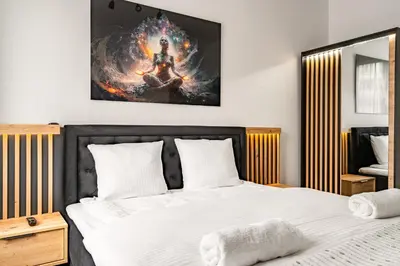 Łóżko lub łóżka w pokoju w obiekcie RentPlanet - Apartament Grabiszyńska