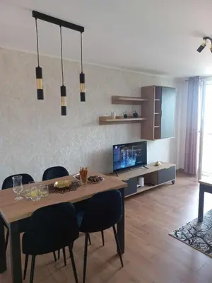 Telewizja i/lub zestaw kina domowego w obiekcie Apartament blisko Rynku