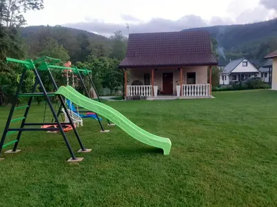 Plac zabaw dla dzieci w obiekcie Domek Przy Zalewie Z Balią